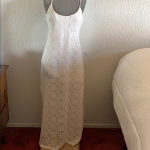 Lace maxi dress with slit on sides.